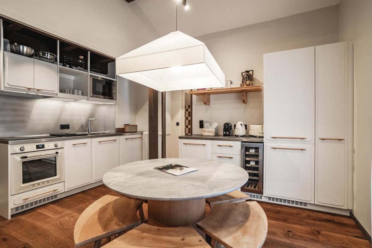 Cuisine ou kitchenette dans l'établissement Appartements de l'Héliopic