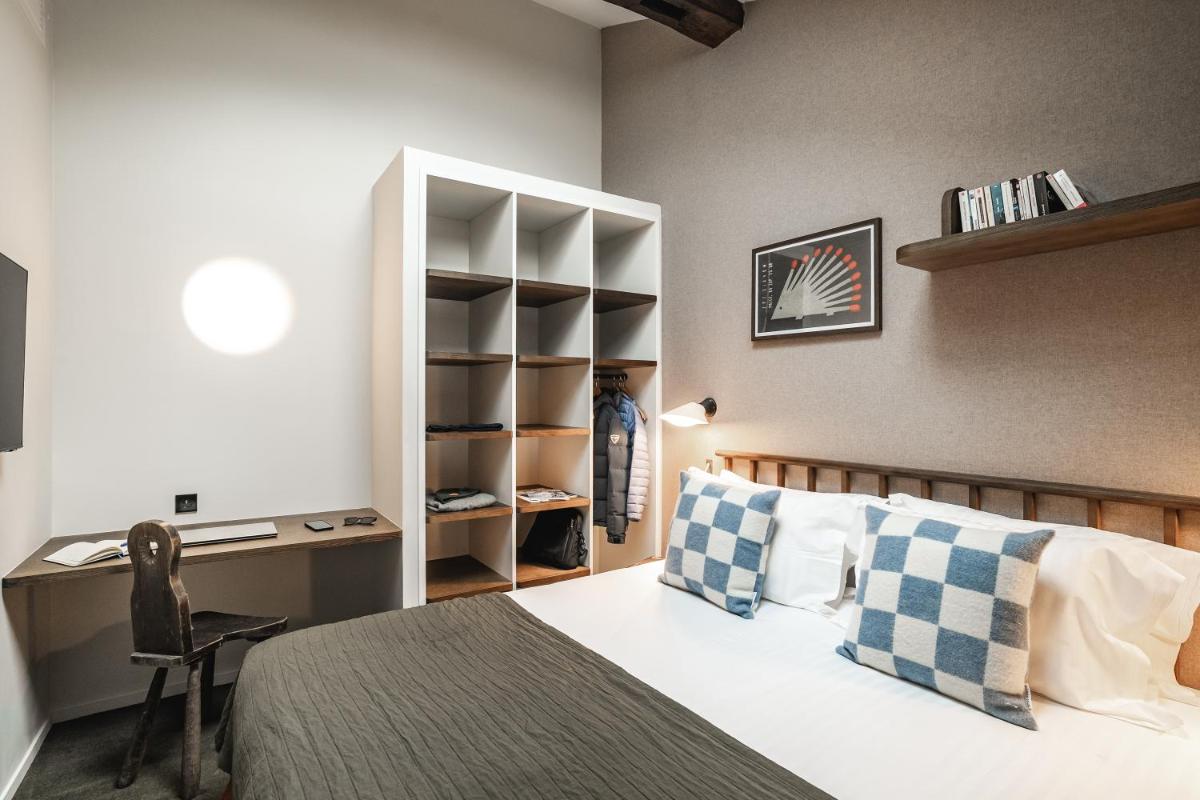 Un ou plusieurs lits dans un hébergement de l'établissement Appartements de l'Héliopic