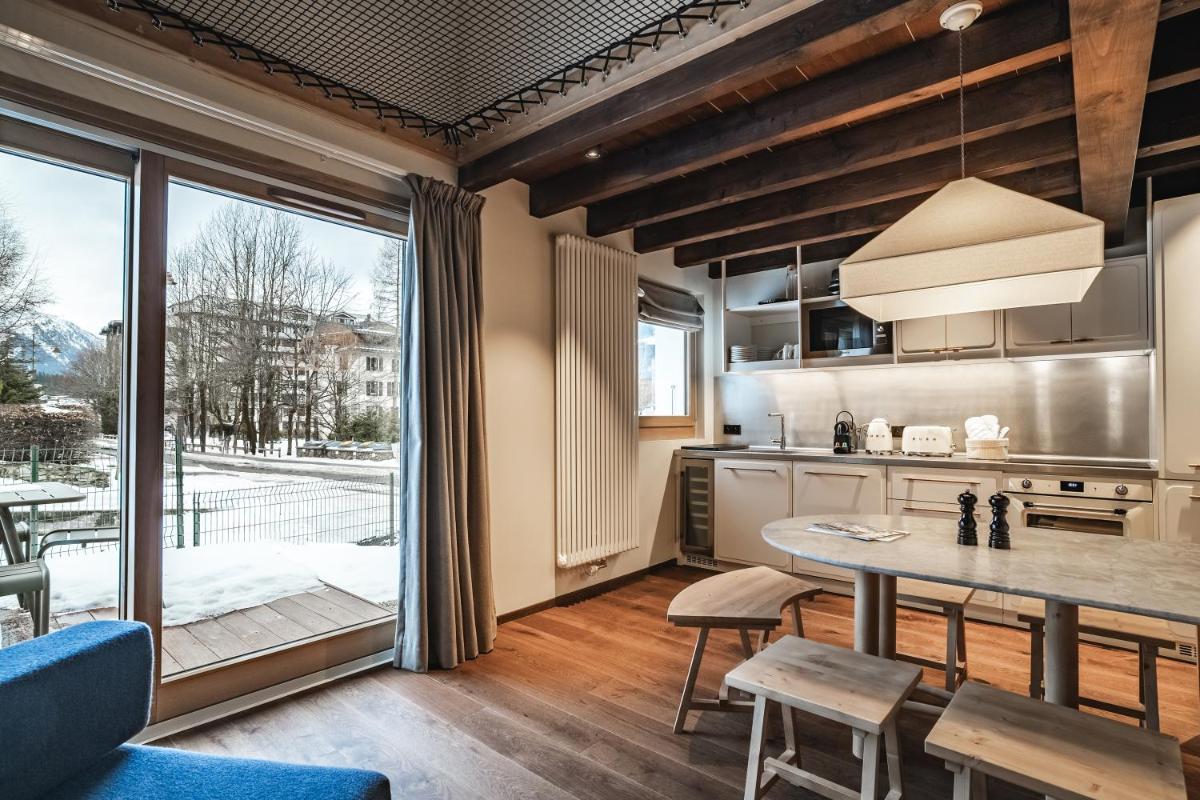 Cuisine ou kitchenette dans l'établissement Appartements de l'Héliopic