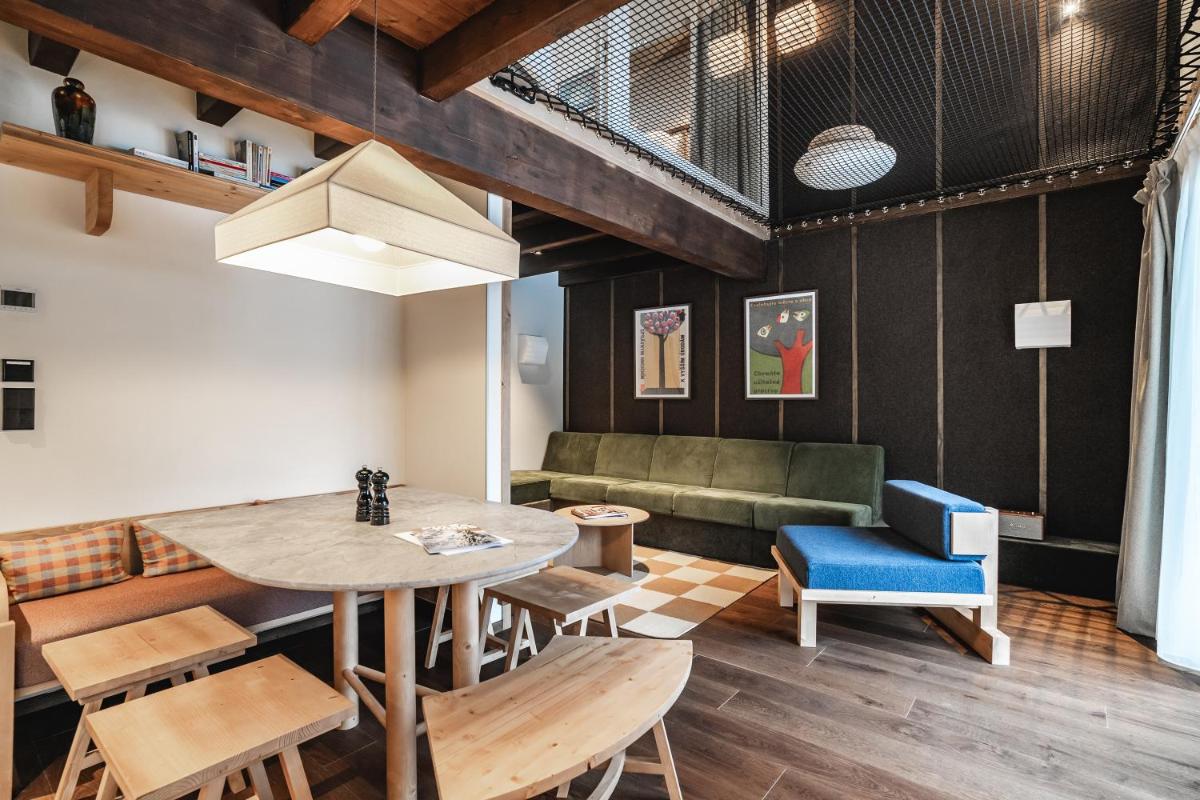 Coin salon dans l'établissement Appartements de l'Héliopic