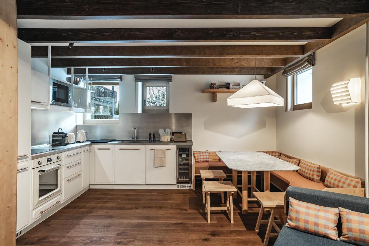 Cuisine ou kitchenette dans l'établissement Appartements de l'Héliopic