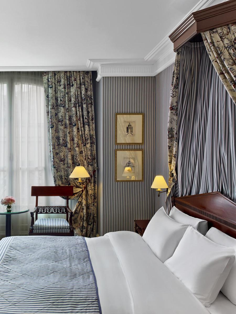 Un ou plusieurs lits dans un hébergement de l'établissement Le Dokhan's Paris Arc de Triomphe, a Tribute Portfolio Hotel