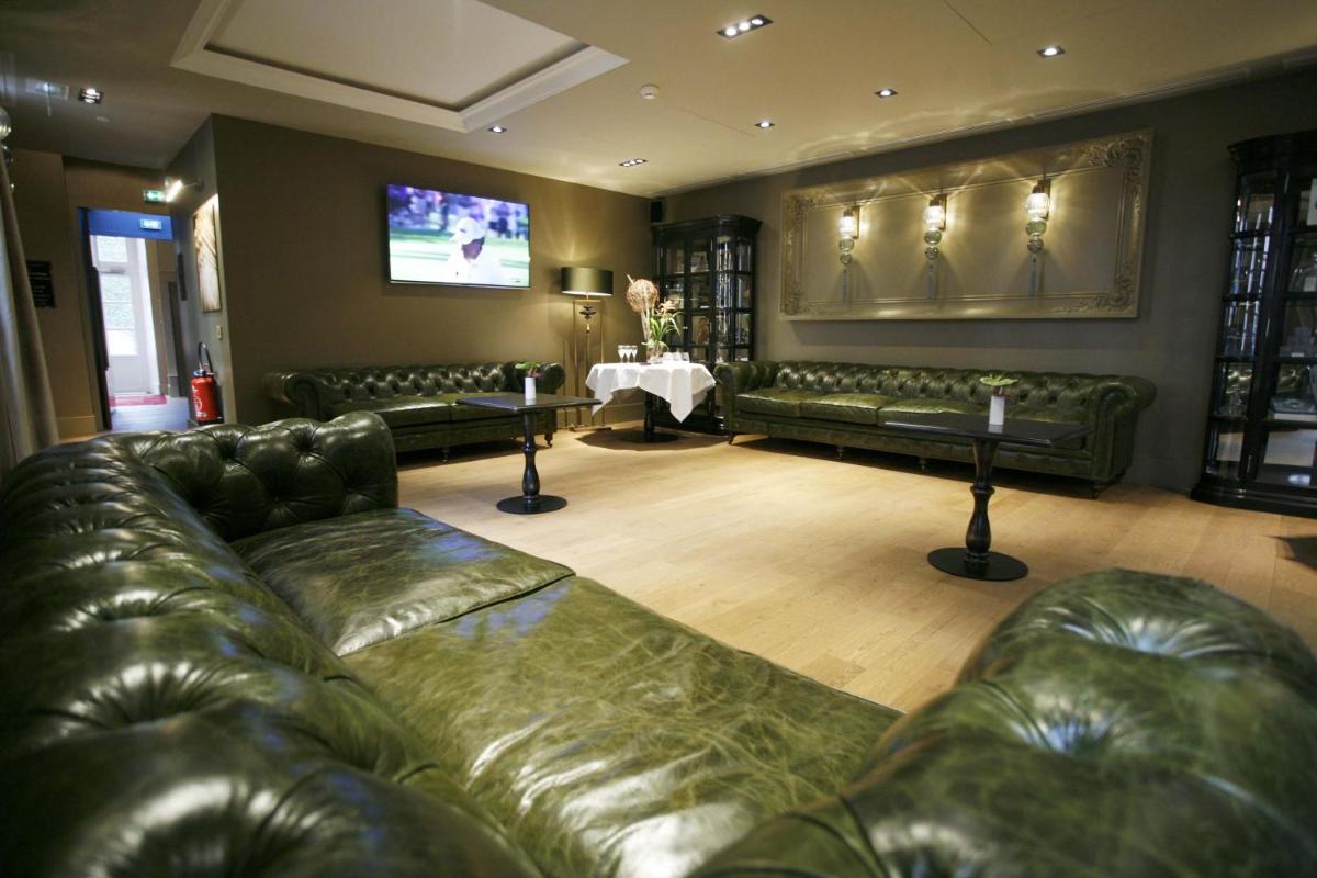 Coin salon dans l'établissement La Cour des Consuls Hotel & Spa Toulouse - MGallery Collection