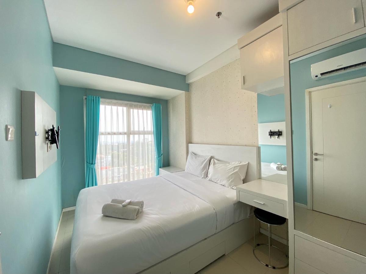 2BR Cozy Apartment at Parahyangan Residence By Travelio - Housity