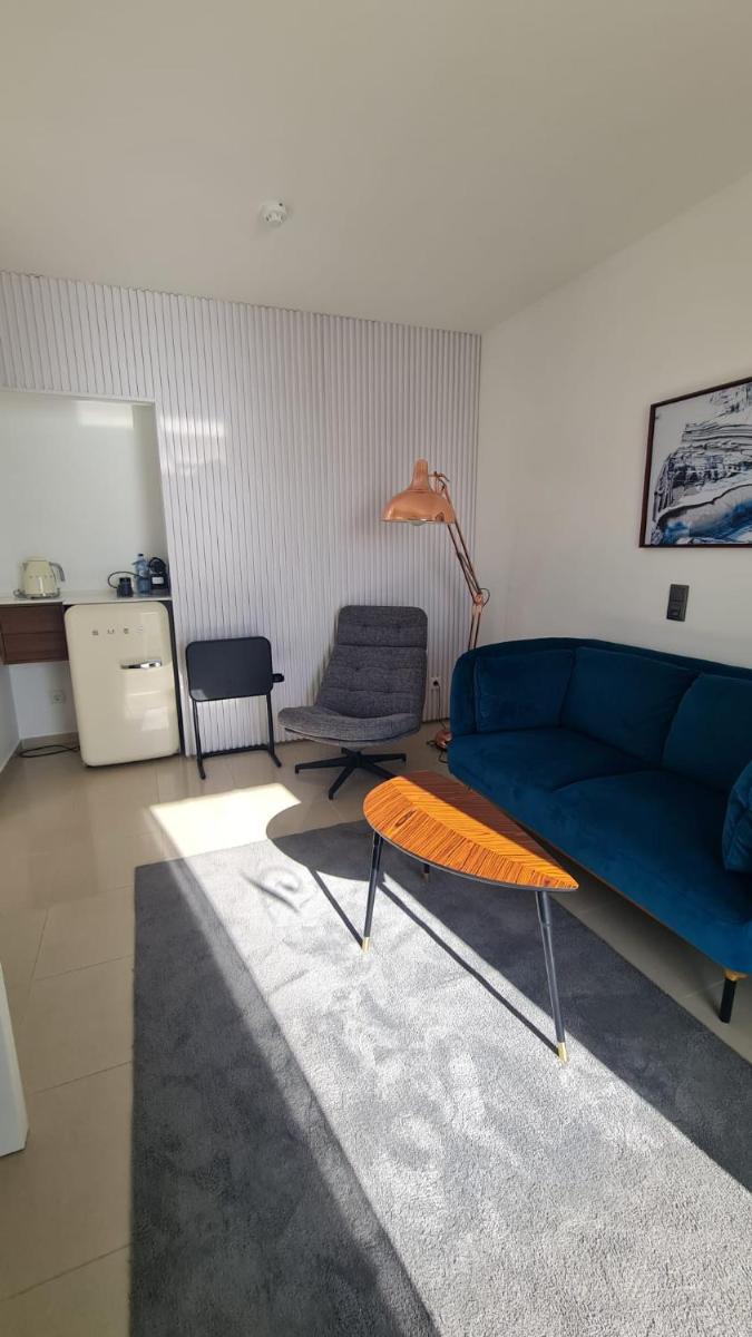 Uma área de estar em Rocamar Exclusive Hotel & Spa - Adults Only
