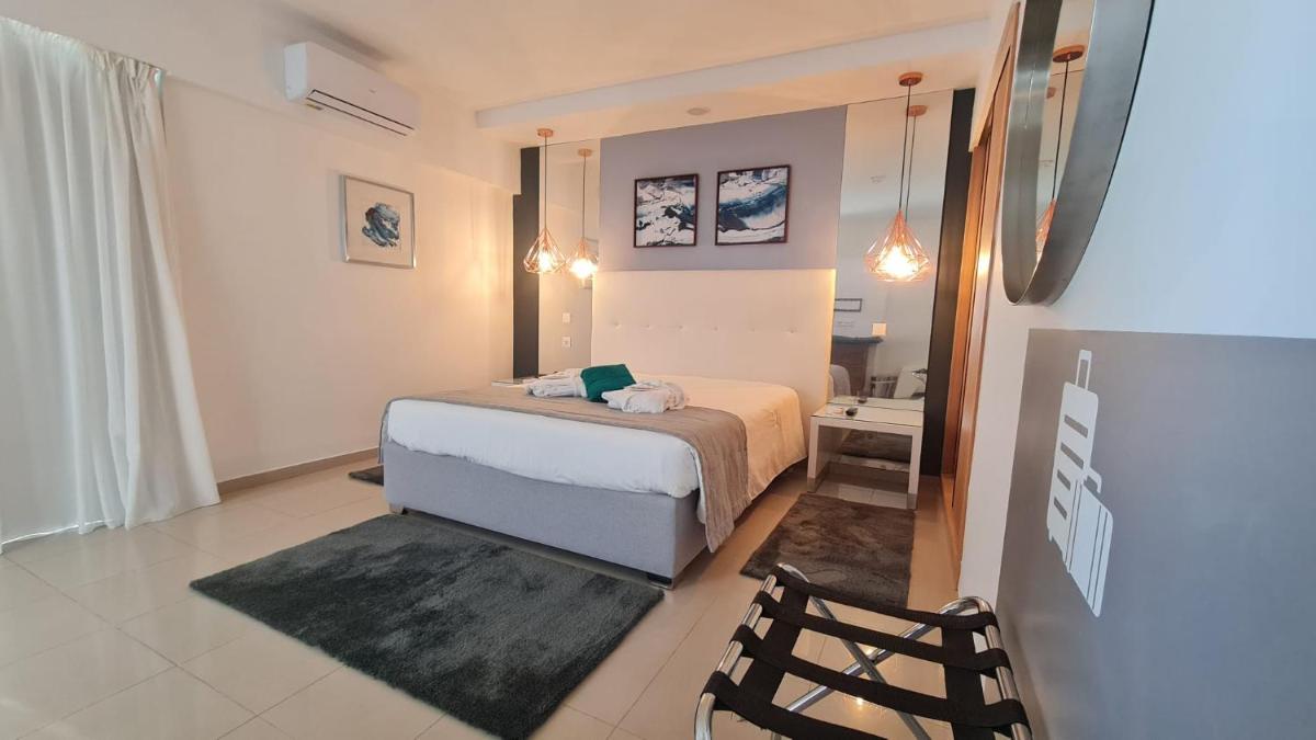Uma cama ou camas num quarto em Rocamar Exclusive Hotel & Spa - Adults Only