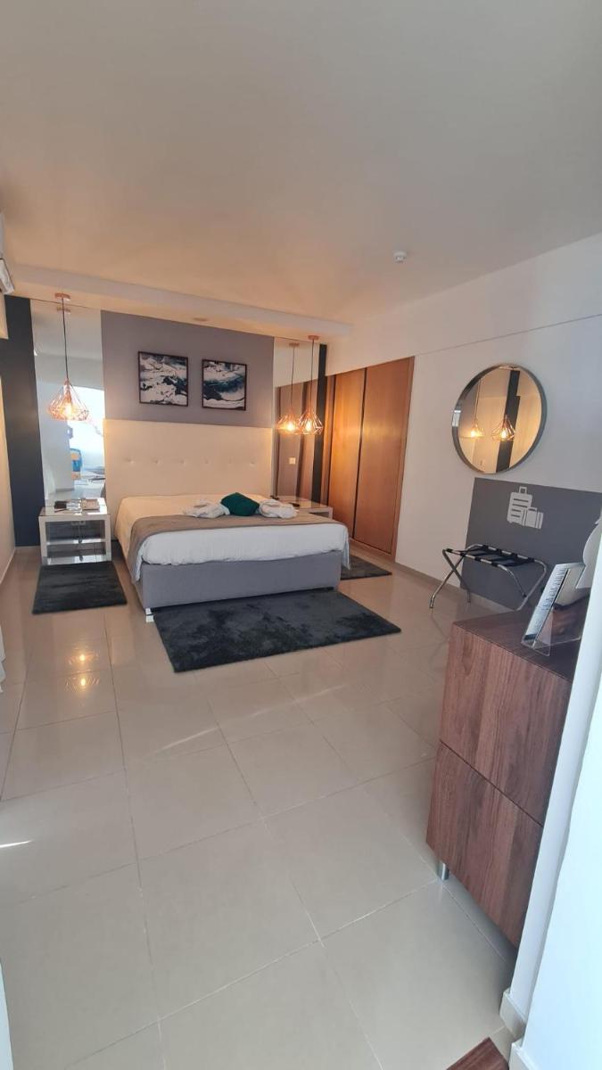 Uma cama ou camas num quarto em Rocamar Exclusive Hotel & Spa - Adults Only