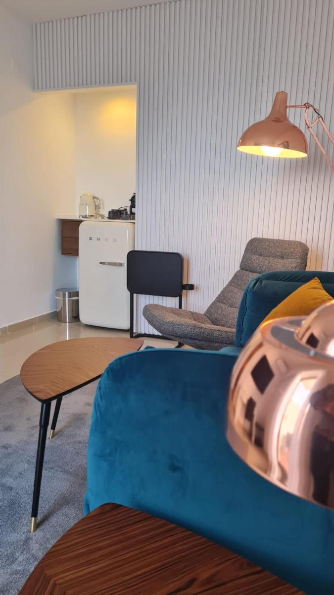 Uma área de estar em Rocamar Exclusive Hotel & Spa - Adults Only