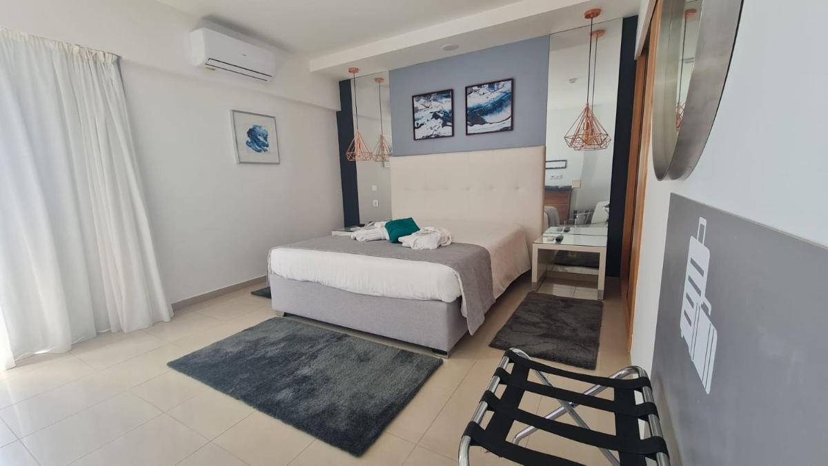 Uma cama ou camas num quarto em Rocamar Exclusive Hotel & Spa - Adults Only