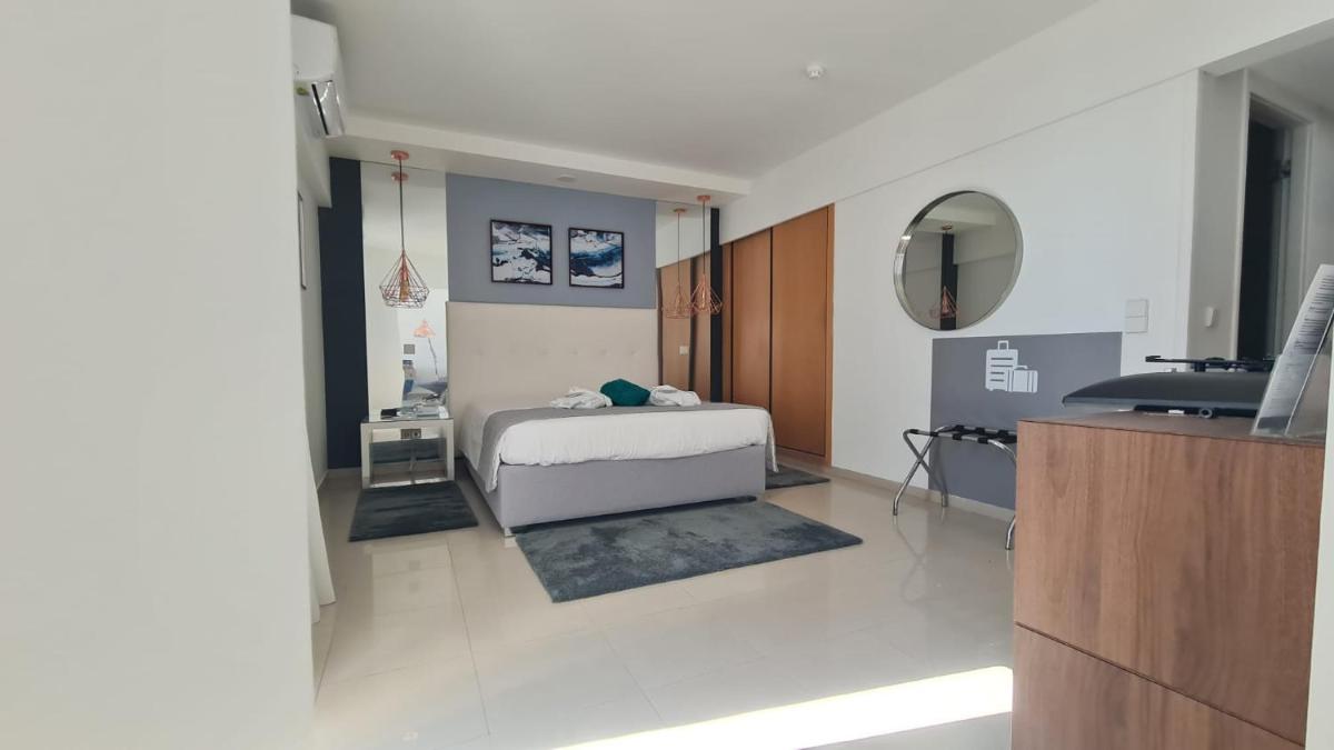 Uma cama ou camas num quarto em Rocamar Exclusive Hotel & Spa - Adults Only