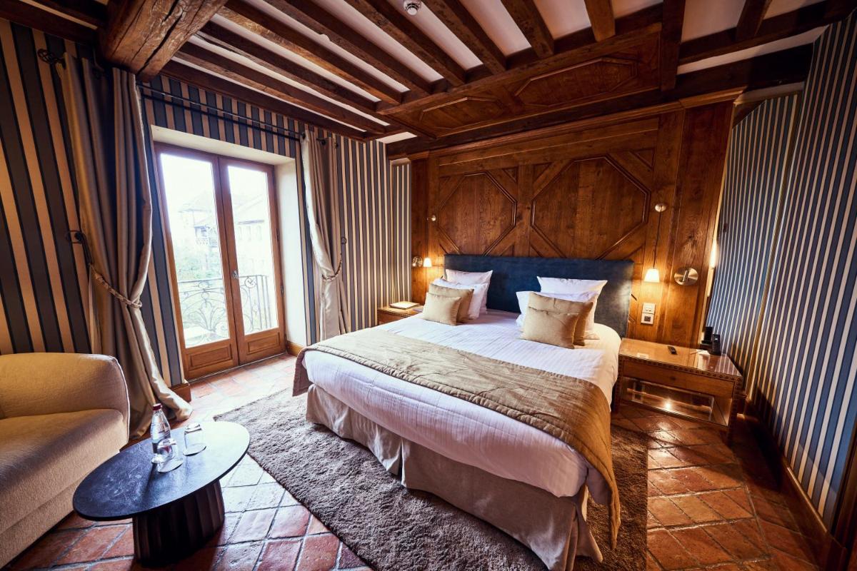 Un ou plusieurs lits dans un hébergement de l'établissement Relais Bernard Loiseau