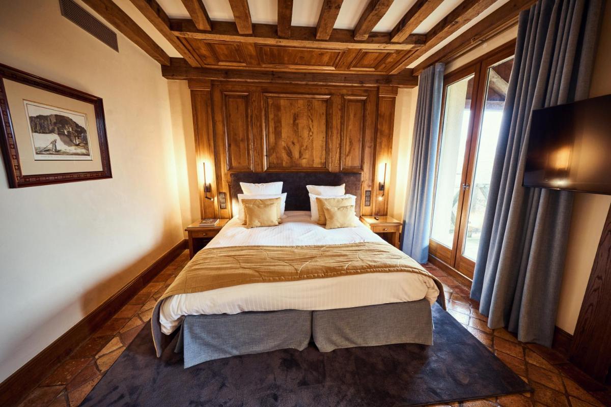 Un ou plusieurs lits dans un hébergement de l'établissement Relais Bernard Loiseau