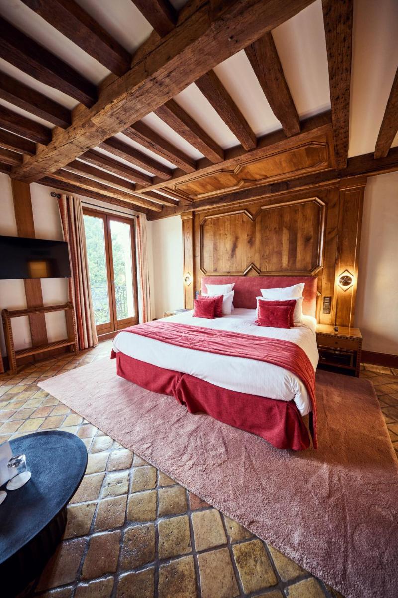 Un ou plusieurs lits dans un hébergement de l'établissement Relais Bernard Loiseau