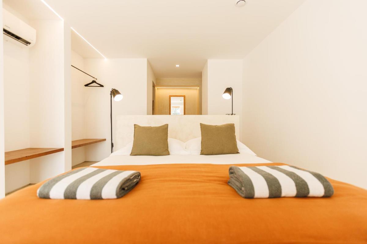 Uma cama ou camas num quarto em Sorraia Hotel Rural