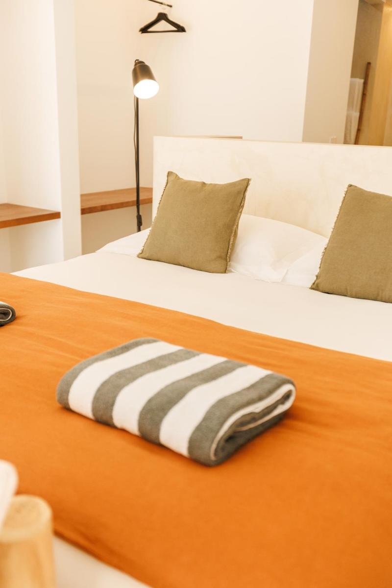 Uma cama ou camas num quarto em Sorraia Hotel Rural