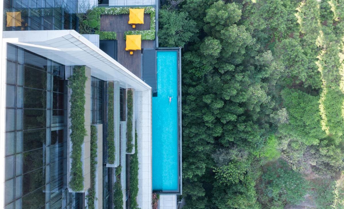 an overhead view of a building and a forest at Trident Hyderabad in Hyderabad
