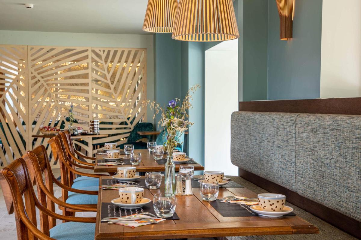 Coin salon dans l'établissement Domaine Du Roncemay - Hôtel, Restaurants, Spa & Golf