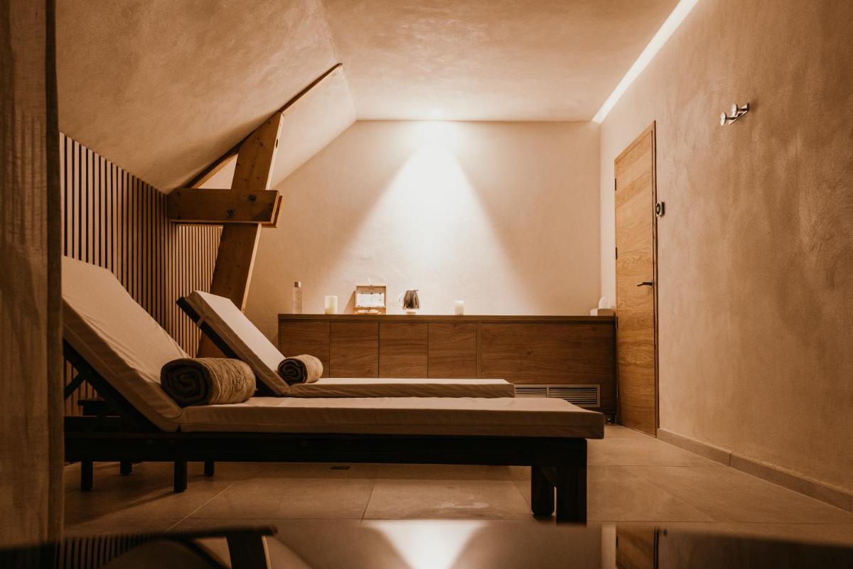 Coin salon dans l'établissement Domaine Du Roncemay - Hôtel, Restaurants, Spa & Golf