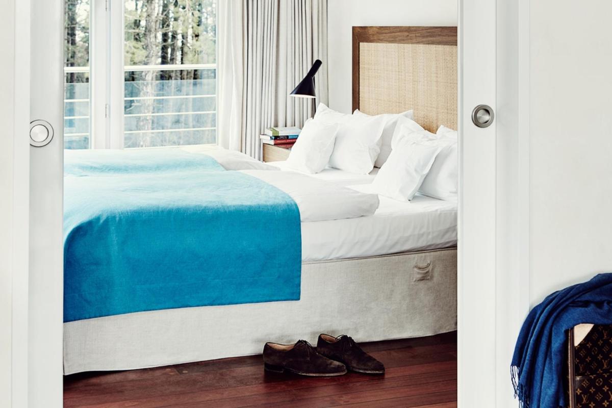 Ein Bett oder Betten in einem Zimmer der Unterkunft Hotel Fährhaus