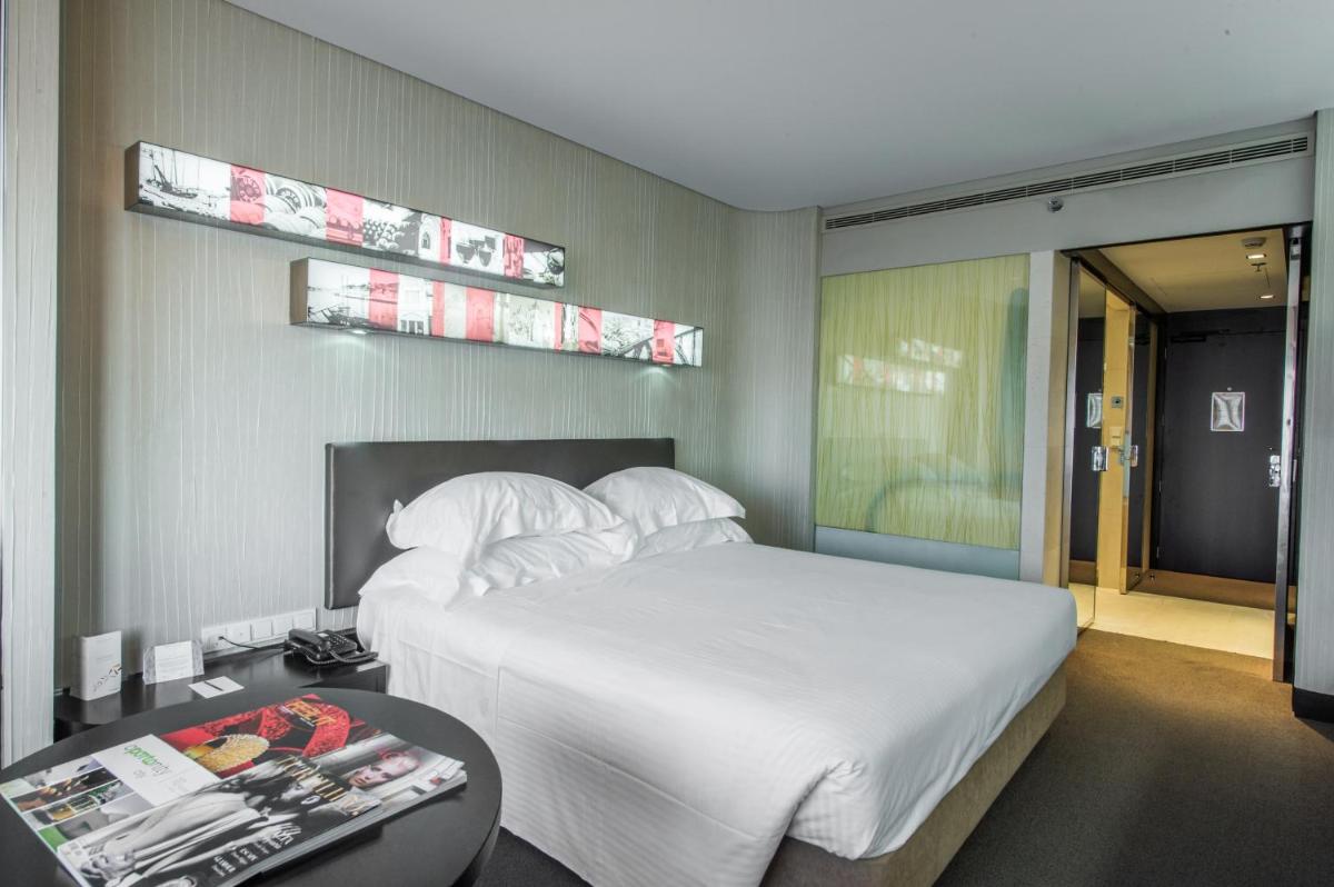 Uma cama ou camas num quarto em Porto Palácio Hotel by The Editory