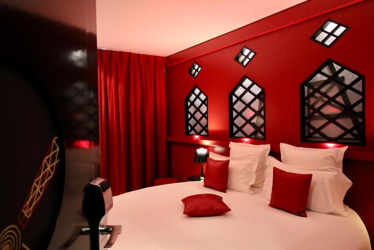 Un ou plusieurs lits dans un hébergement de l'établissement Secret de Paris - Hotel & Spa