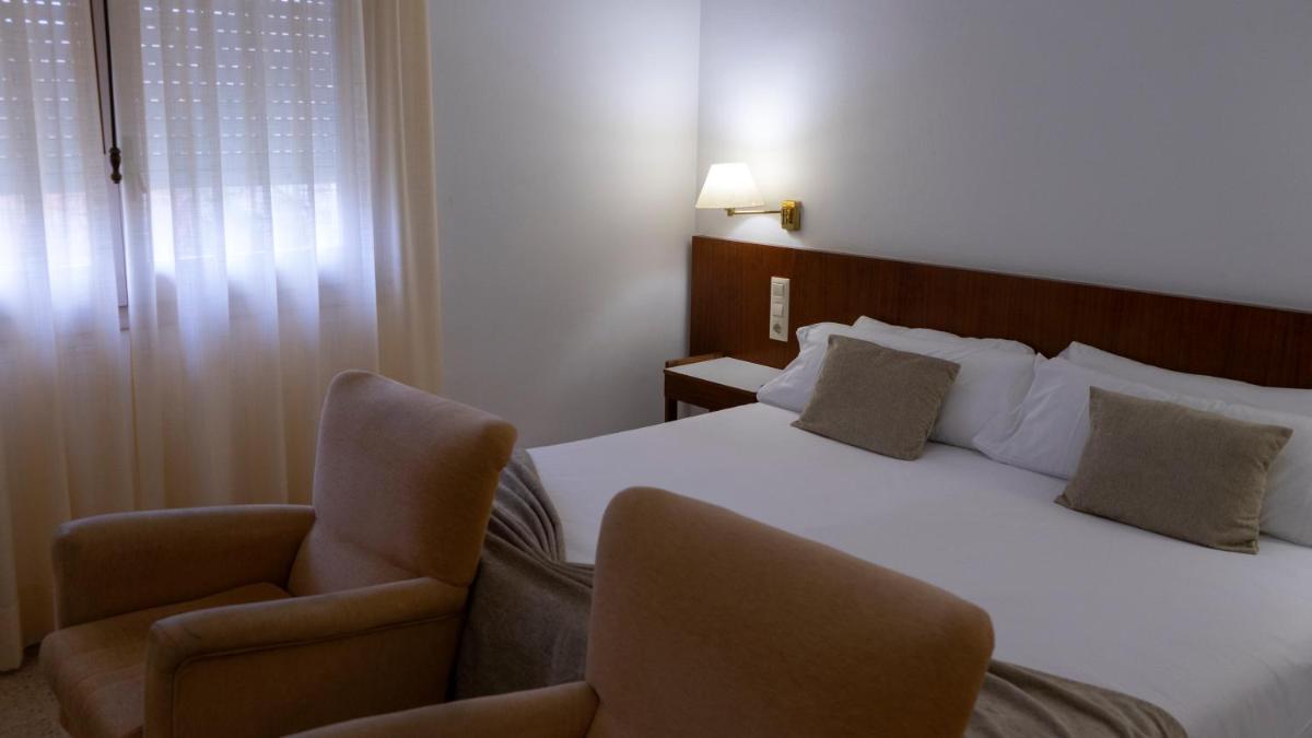 Cama o camas de una habitación en Hotel Balneario Prats