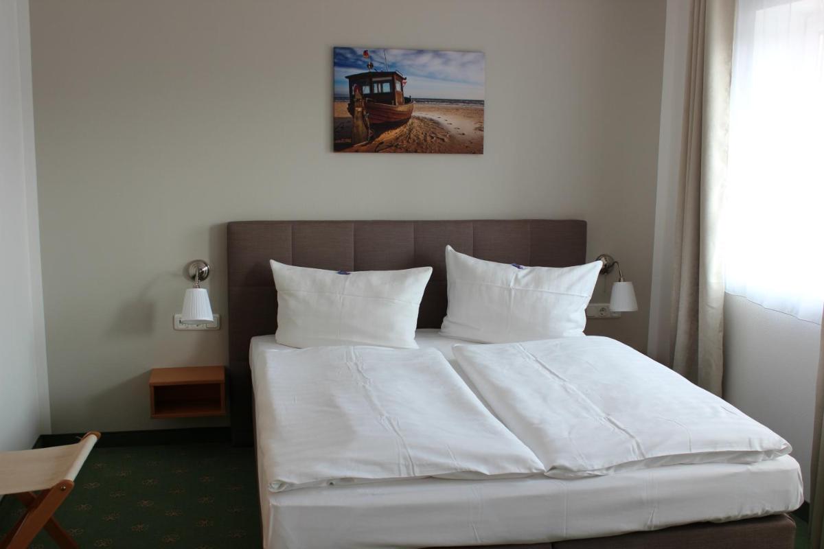 Hotel Garni Zur Zwiebel - Housity