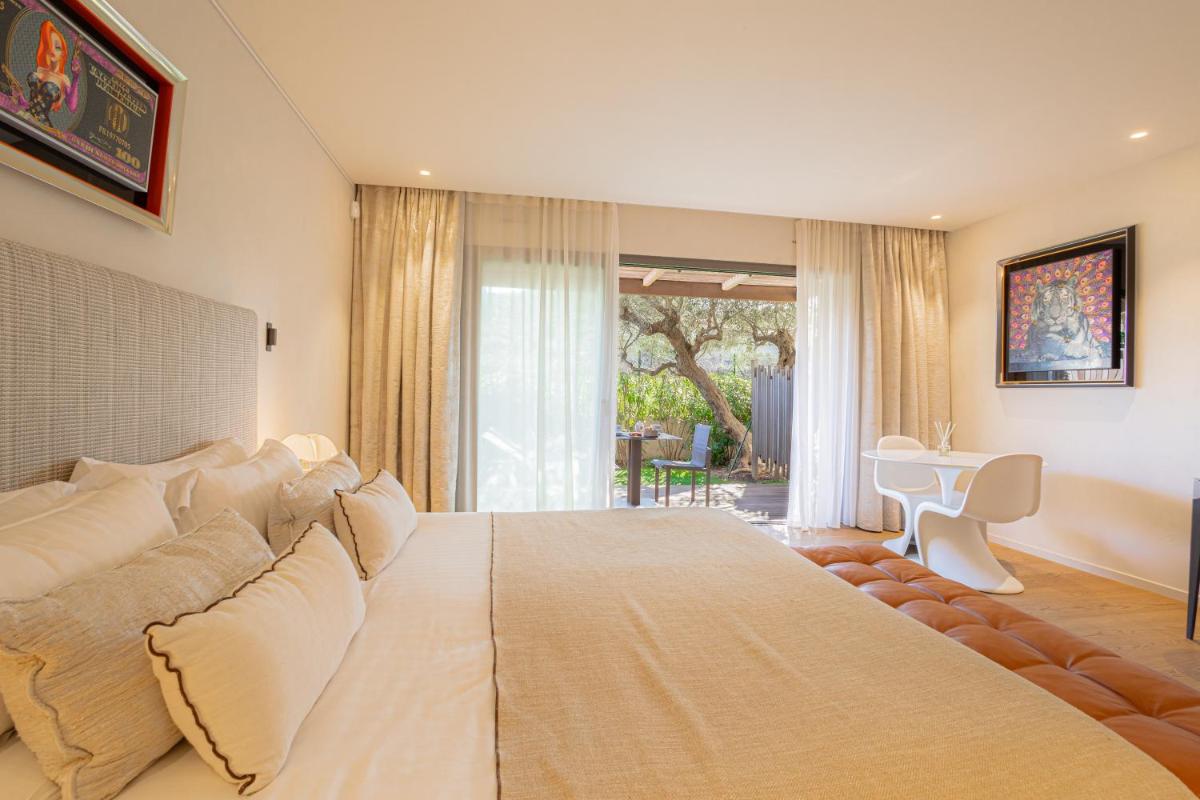 Un ou plusieurs lits dans un hébergement de l'établissement Villa Cosy, hotel & spa