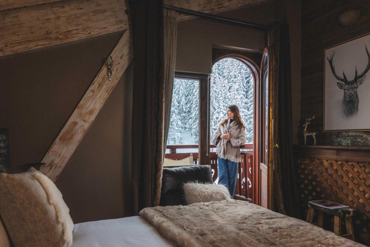 Un ou plusieurs lits dans un hébergement de l'établissement Hotel Carlina