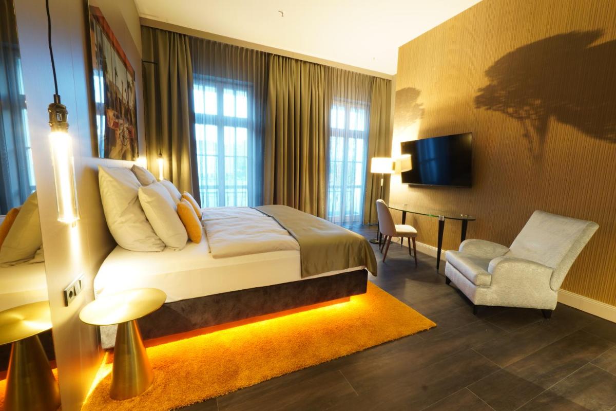 TV/Unterhaltungsangebot in der Unterkunft Lumière Boutiquehotel im Fürstenhof Leipzig TV/Unterhaltungsangebot in der Unterkunft Lumière Boutiquehotel im Fürstenhof Leipzig