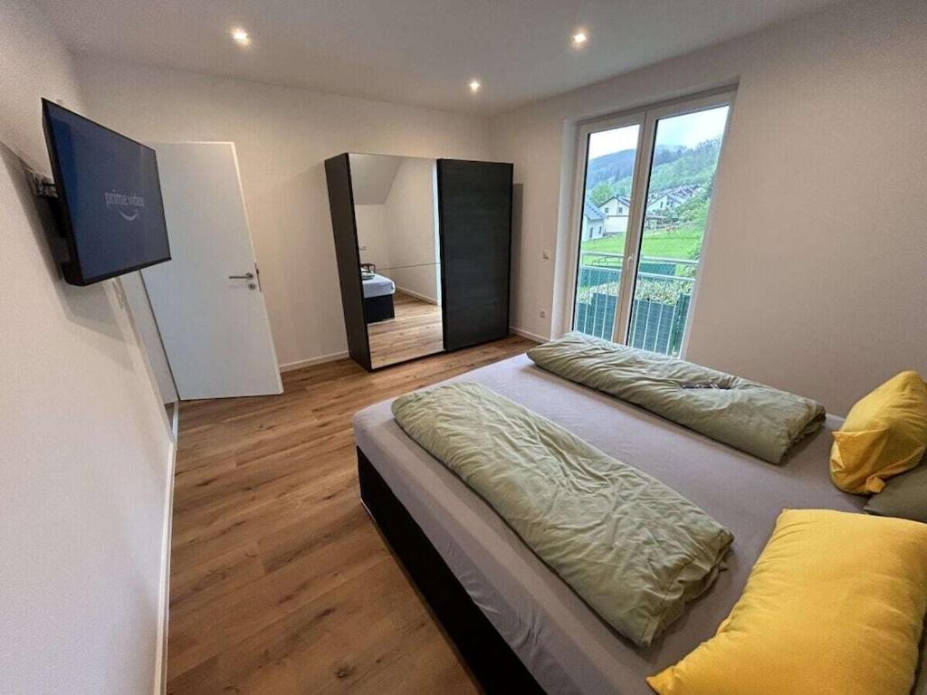 Wellness holiday home with steam bath & sauna in the Eifel - Housity