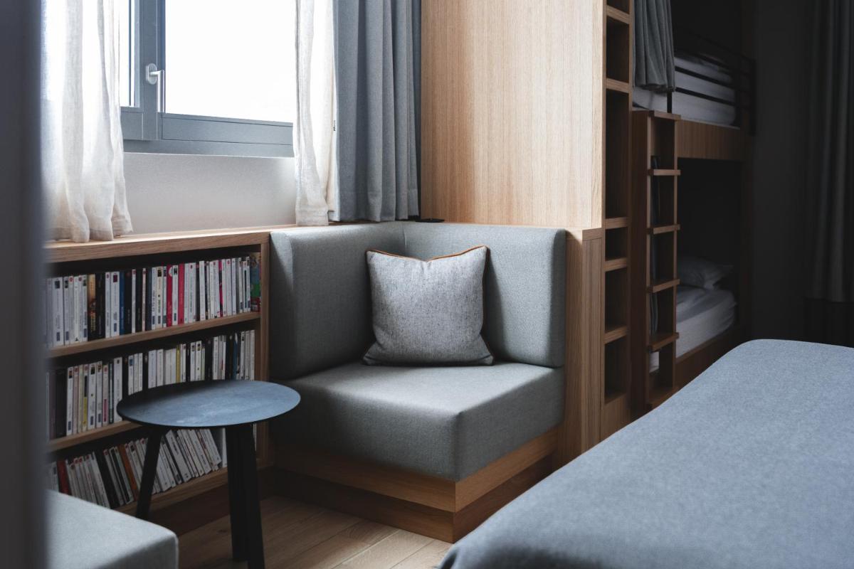 Un ou plusieurs lits dans un hébergement de l'établissement Heliopic Hotel & Spa