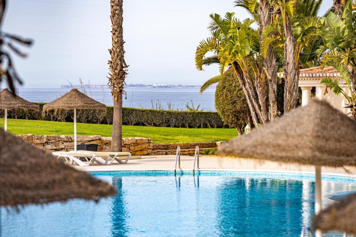 A piscina em ou perto de Clube Porto Mos - Sunplace Hotels & Beach Resort