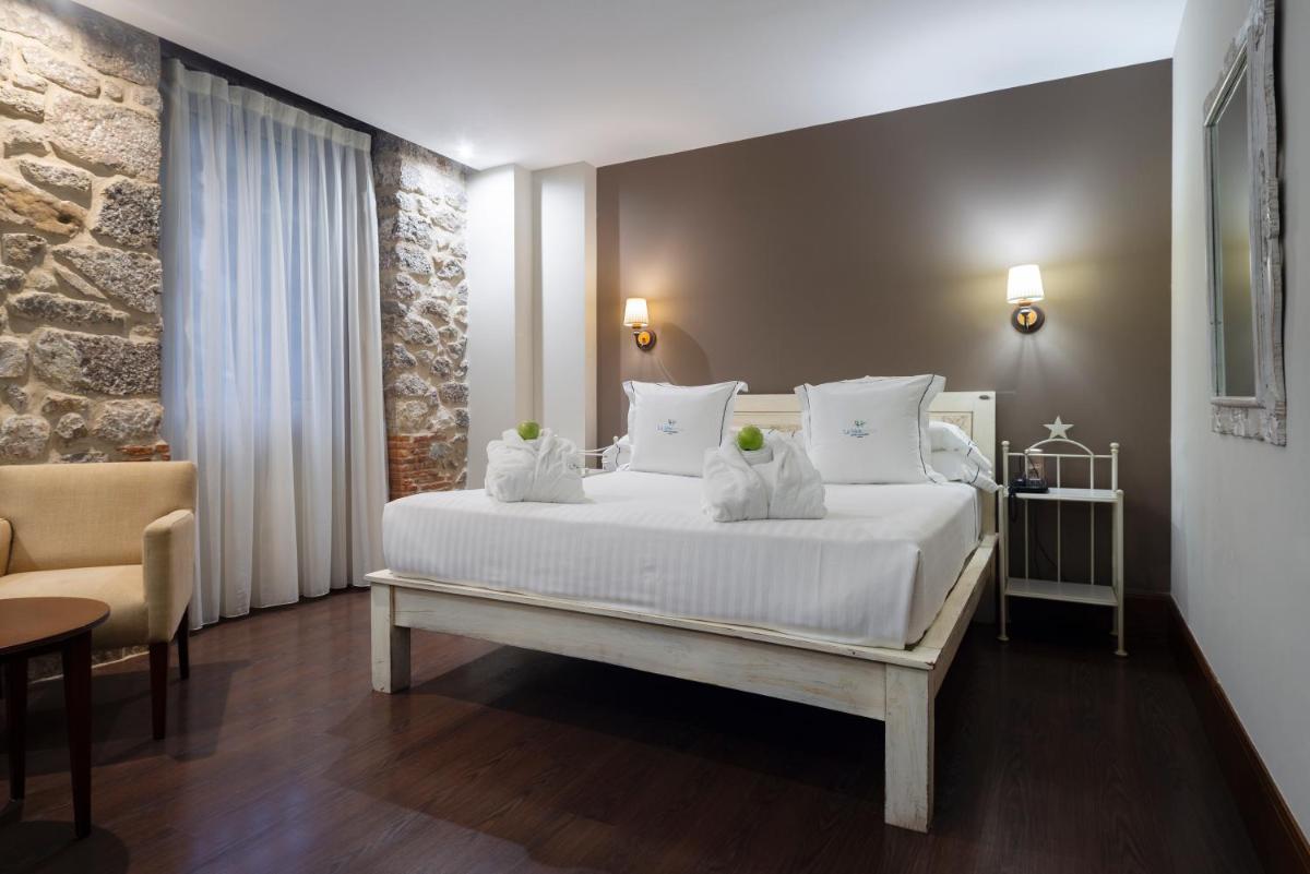 Cama o camas de una habitación en Hotel Balneario La Hermida