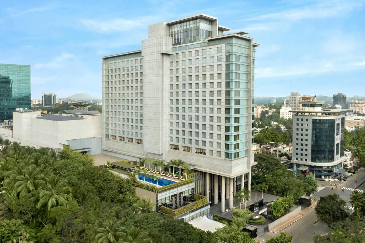 an aerial view of a tall white building at JW Marriott Pune in Pune