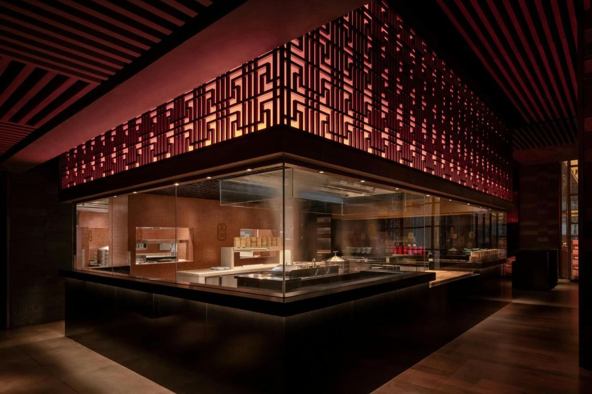 a display case in a building with red lights at JW Marriott Pune in Pune