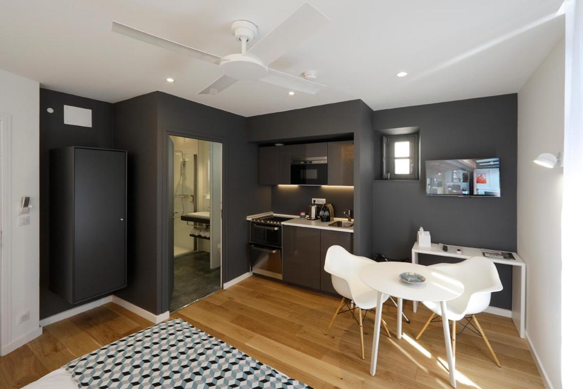 Cuisine ou kitchenette dans l'établissement Les Maisons du Pont - Charme & Caractère
