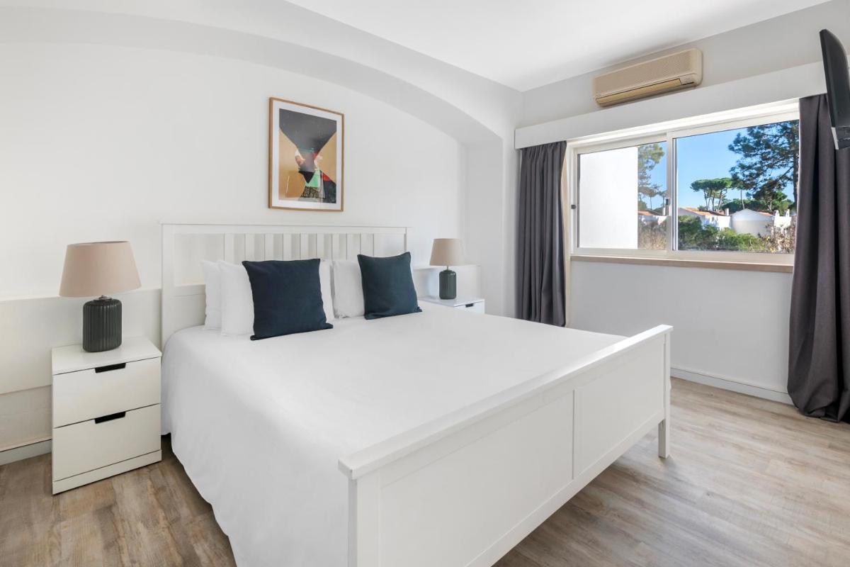 Uma cama ou camas num quarto em Vilar do Golf