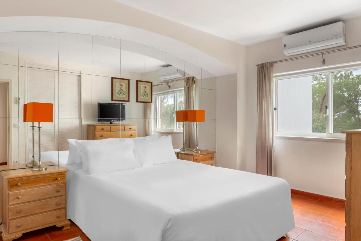 Uma cama ou camas num quarto em Vilar do Golf