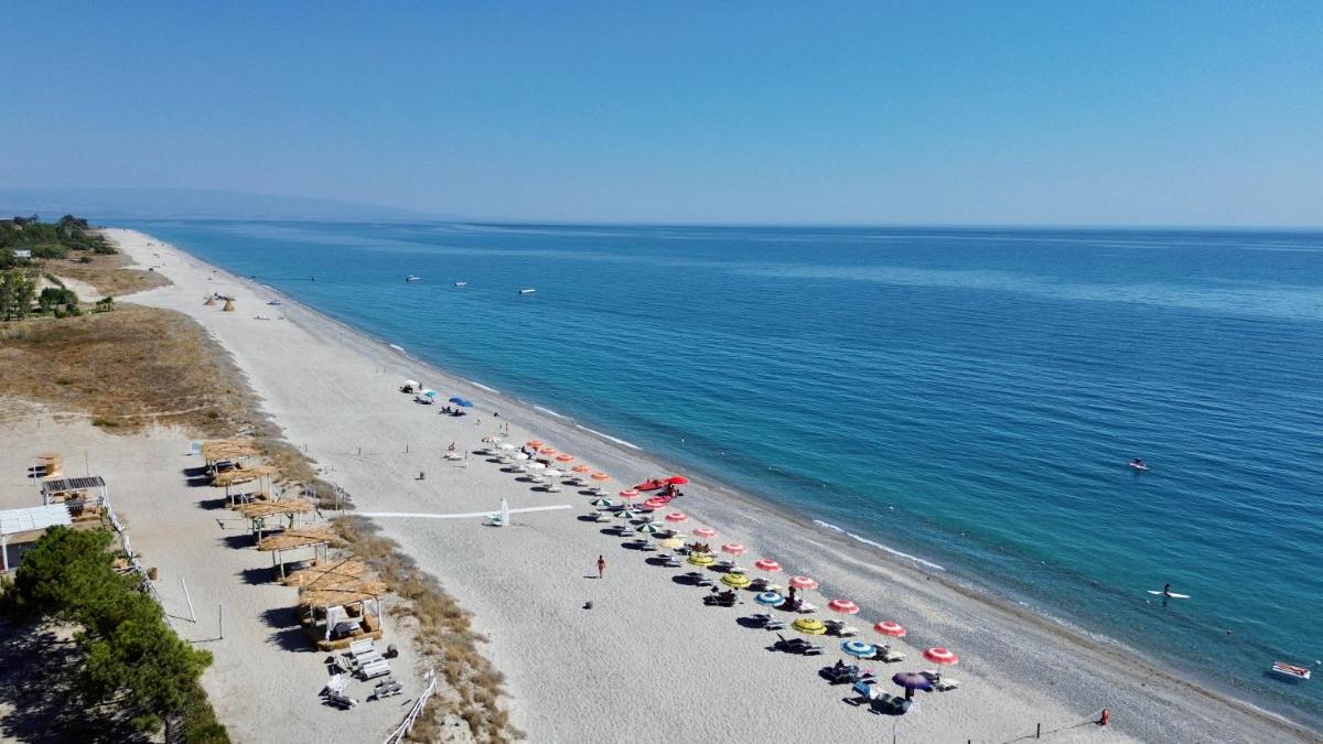 Villaggio Camping Poseidon - Bungalows & Rooms with Sea View in Nature - Housity
