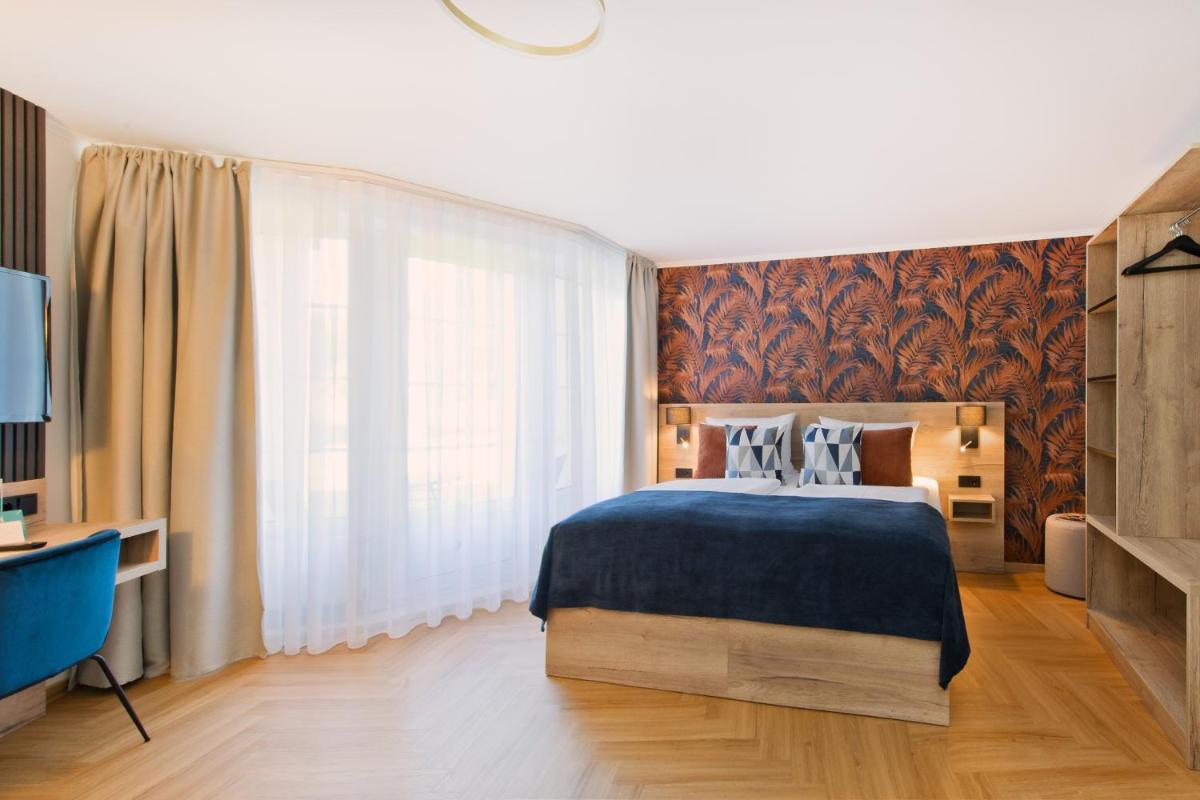 Atrium Hotel Amadeus - Housity