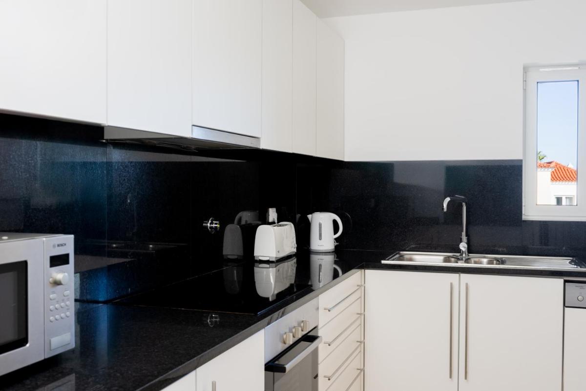 A cozinha ou kitchenette de Eden Villas & Apartments