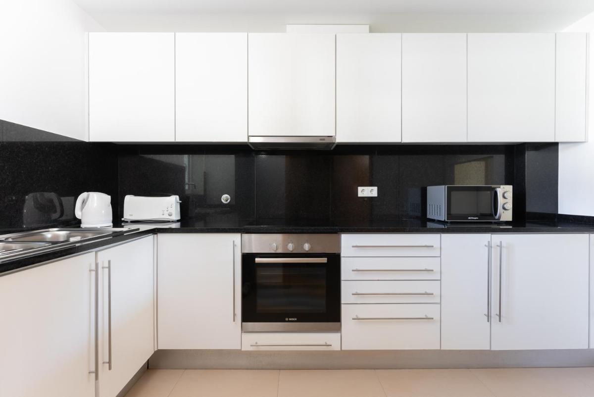A cozinha ou kitchenette de Eden Villas & Apartments