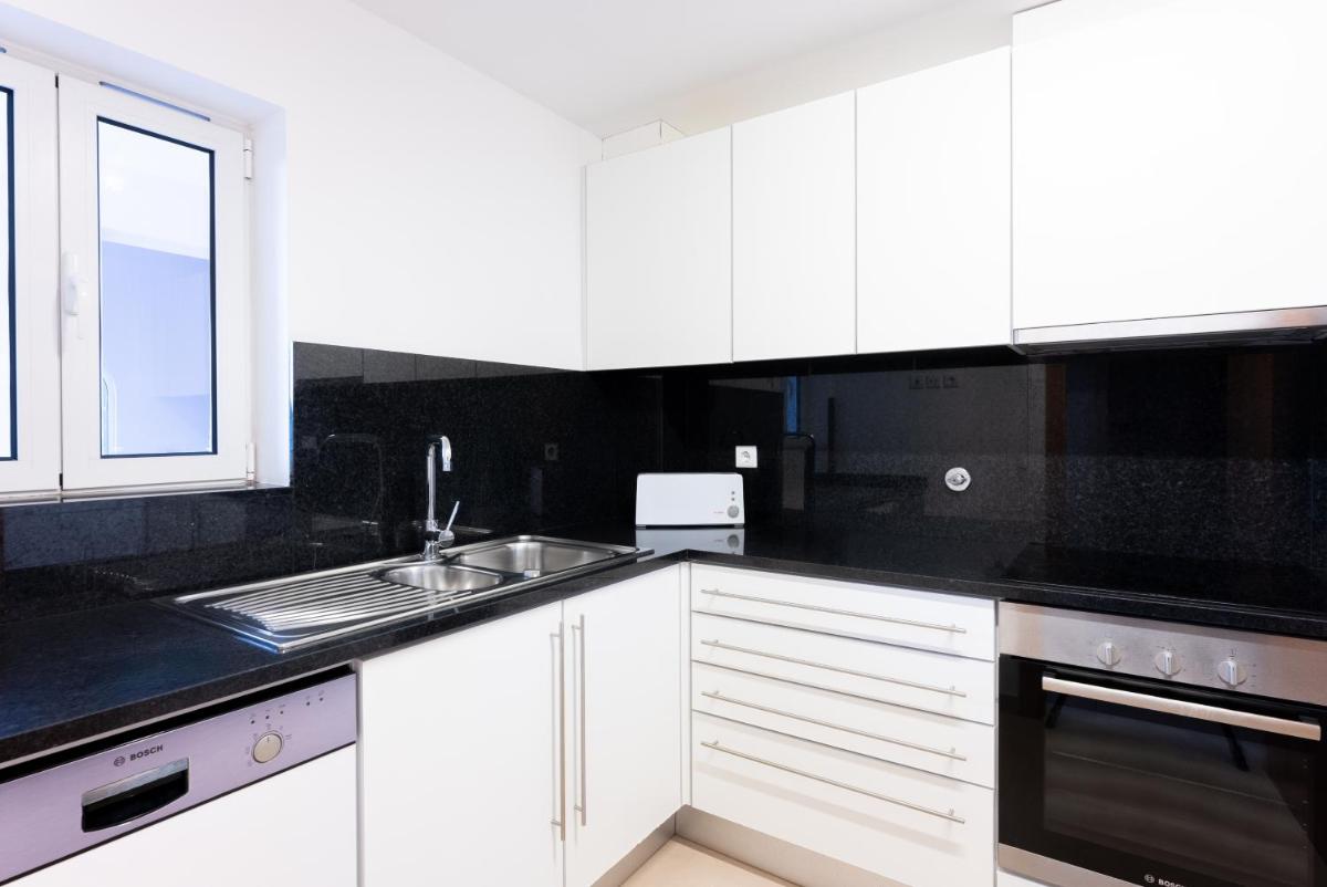 A cozinha ou kitchenette de Eden Villas & Apartments