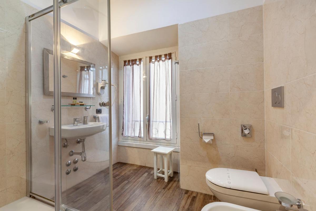 Inn Rome Rooms & Suites - Housity