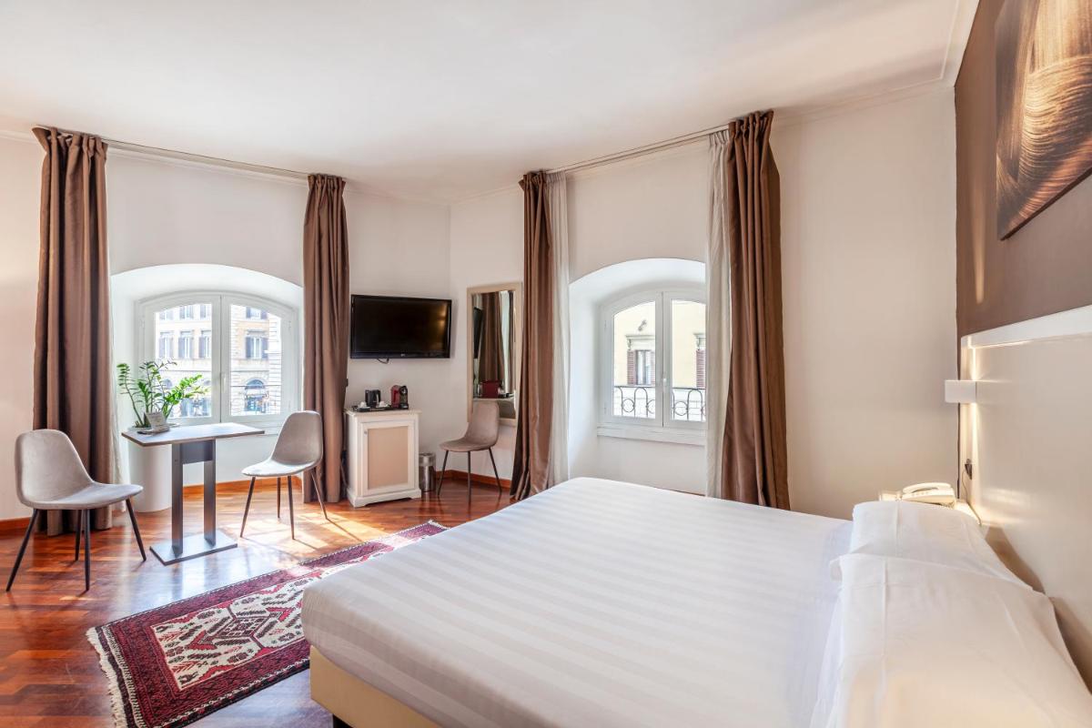 Inn Rome Rooms & Suites - Housity