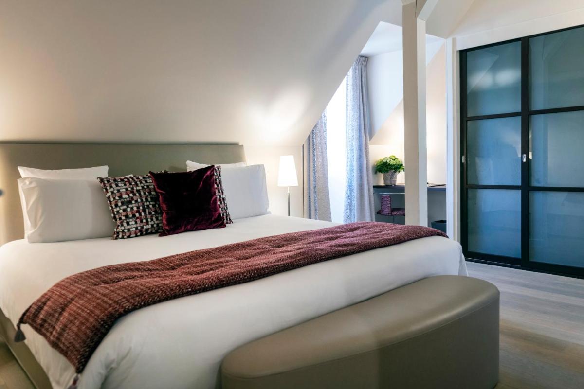 Un ou plusieurs lits dans un hébergement de l'établissement Hotel & Spa REGENT PETITE FRANCE