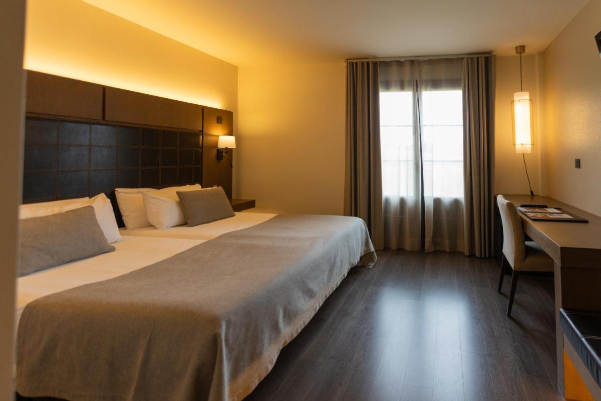 Cama o camas de una habitación en La Piconera Hotel & Spa