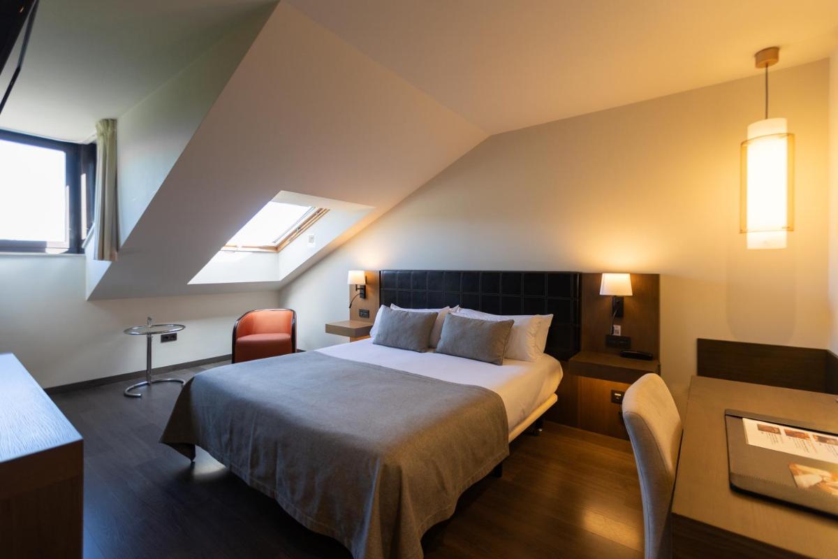 Cama o camas de una habitación en La Piconera Hotel & Spa