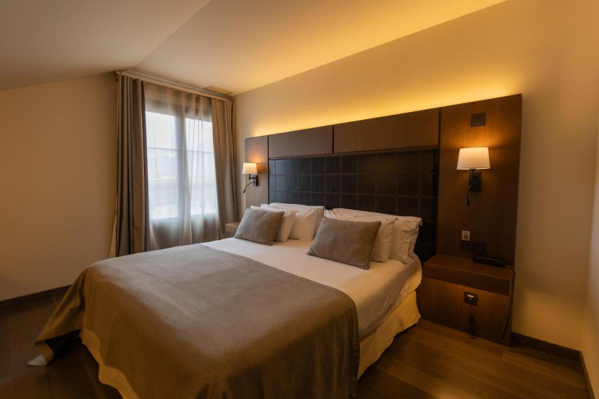 Cama o camas de una habitación en La Piconera Hotel & Spa